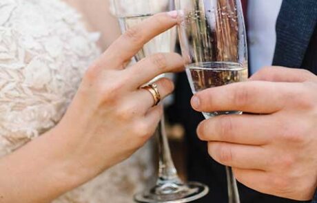 Bride and Groom Cheers with Champagne