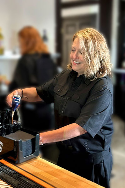 Woman working from Boomtown Catering